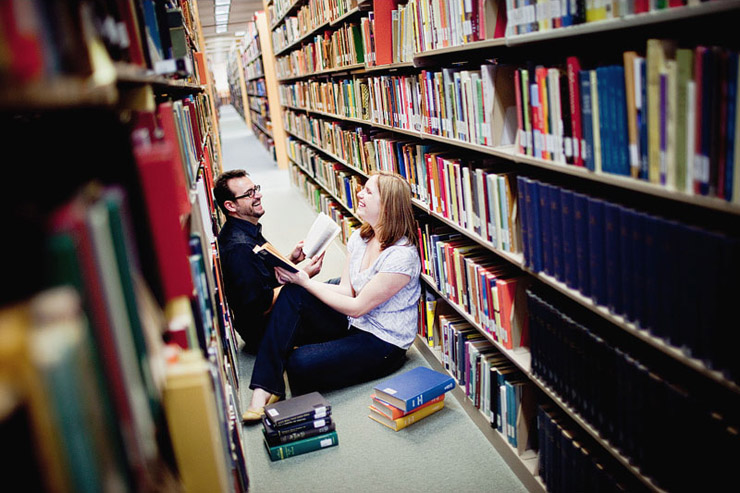 cute book engagement photos in library
