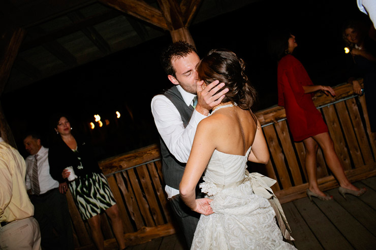 bride and groom kiss