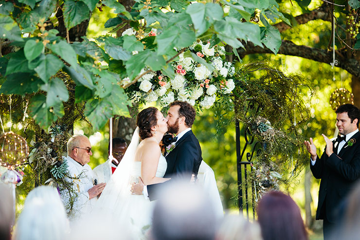 bride and groom kiss