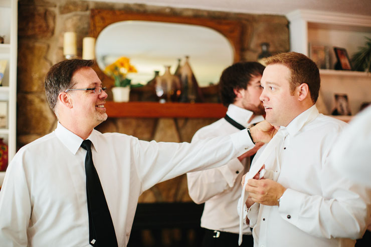 dad helping groom