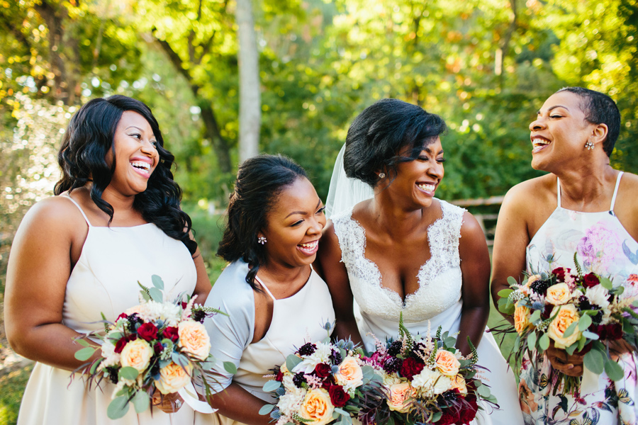 laughing bridal party